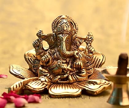 DreamKraft Metal Ganesh on Gold Color Leaf (11 cm x 10 cm x 9 cm) DreamKraft Metal Ganesh on Gold Color Leaf (11 cm x 10 cm x 9 cm)