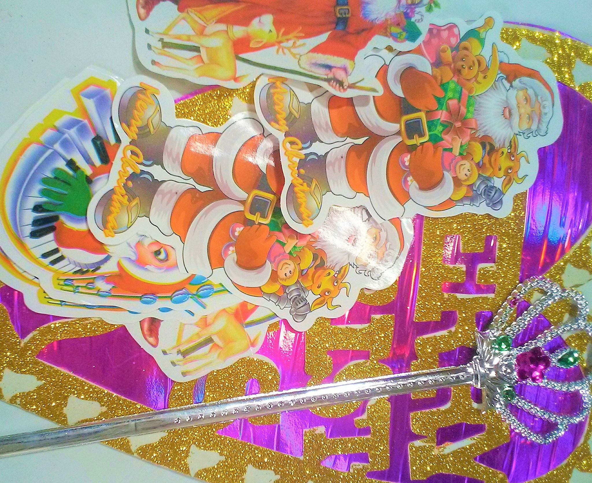 Christmas Decoration Iteams. 10 Pic Santa Stickers , 1 Pic Happy Christmas Wall sticker 1 Fairy Magic Stick.