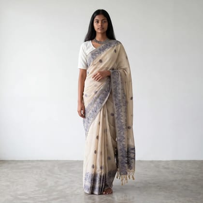 Handwoven Sambalpuri Baandha Ikat Cotton Saree in Ivory and Indigo Handwoven Sambalpuri Baandha Ikat Cotton Saree in Ivory and Indigo