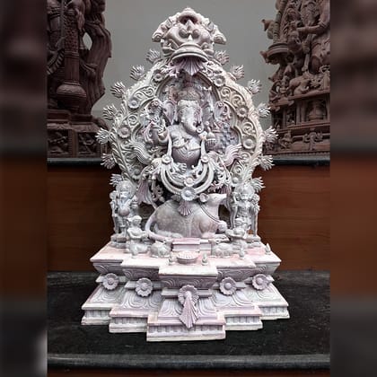 Lord Ganesha sitting on a mouse Pink Stone Statue Lord Ganesha sitting on a mouse Pink Stone Statue