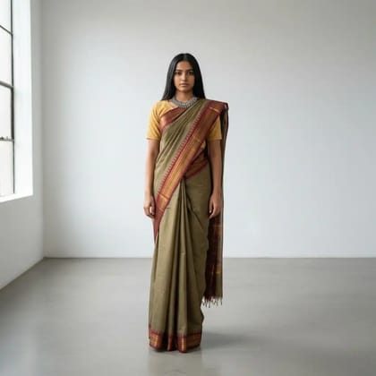 Handwoven Kanchipuram Cotton Saree in Khaki Brown with Temple Border Handwoven Kanchipuram Cotton Saree in Khaki Brown with Temple Border