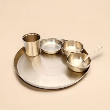 Handcrafted Pure Kansa 6-Piece Round Thali Set (1 round thali, 1 glass, 1 spoon, 2 round bowls and 1 flat bowl) Handcrafted Pure Kansa 6-Piece Round Thali Set (1 round thali, 1 glass, 1 spoon, 2 round bowls and 1 flat bowl)